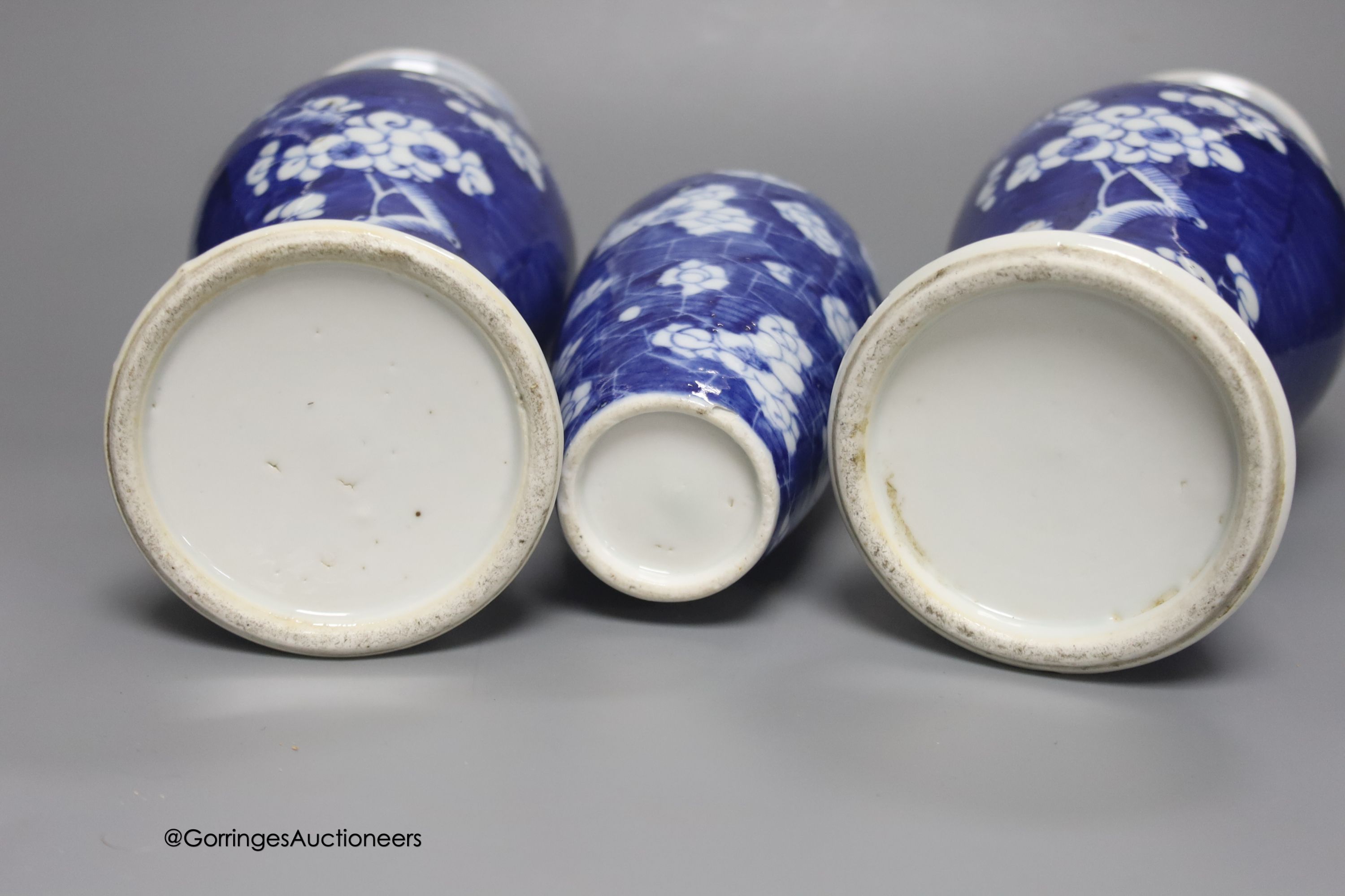 A pair of late 19th century Chinese prunus blossom baluster vases, 30cm, and a Japanese ovoid vase